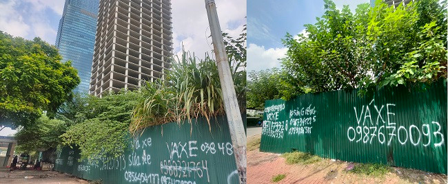 Xung quanh dự án được rào chắn bởi các tấm tôn sơn đầy quảng cáo rao vặt. 