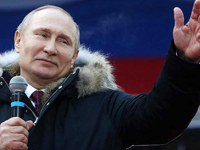 Tổng thống Nga Vladimir Putin vận động tranh cử ở Moscow (Nga) ngày 3-3. Ảnh: GETTY IMAGES