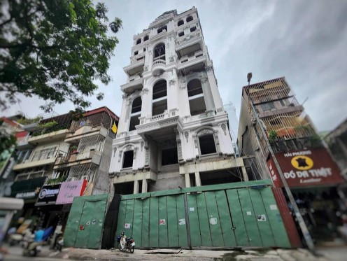 Toa nha 7 tang dinh loat sai pham o quan Ba Dinh: Co the duoc hop thuc hoa?