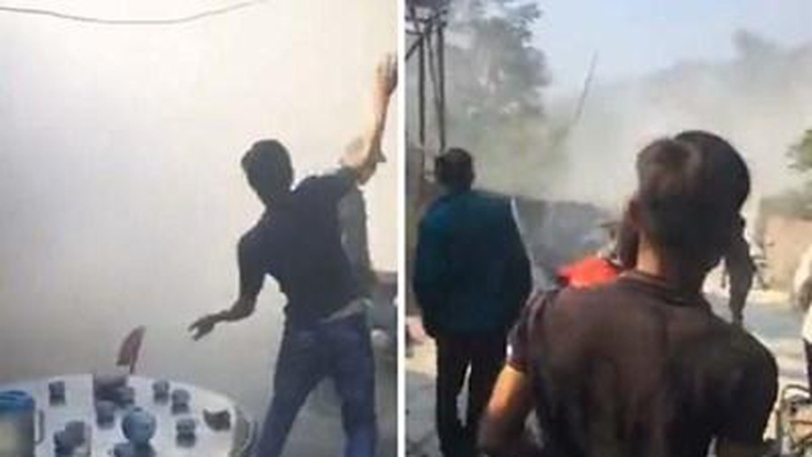 Nguoi dan nem bom xang phan doi cuong che o Van Don, 3 can bo trong thuong