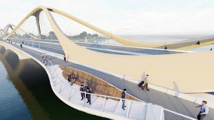 Cầu có đường lên xuống cho người đi bộ, phần đường dành cho người đi bộ nằm ngoài vành vòm và hai đầu cầu có công viên phục vụ người dân vui chơi, giải trí. Ảnh: Báo giao thông