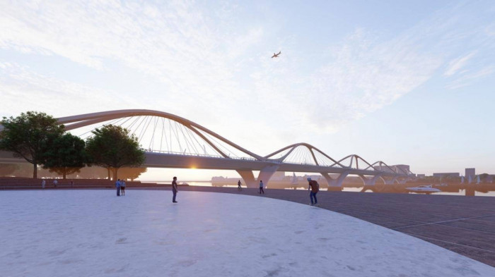 Cầu Trần Hưng Đạo được thiết kế sẽ trở thành trung tâm của Hà Nội mới, kết nối khu phố cổ với các khu vực mới đang phát triển thông qua hình ảnh những làn sóng uốn lượn trên vòm cầu. Ảnh: Báo giao thông