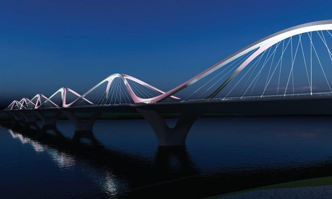 Cầu Trần Hưng Đạo dài 2,4 km, nối quận Hoàn Kiếm với quận Long Biên, sử dụng kết cấu cầu chính dạng vòm thép, mặt cắt ngang cầu tại giữa nhịp rộng 40,66m, tại trụ cầu rộng 47,76m. Ảnh: Hoinhabaovietnam.