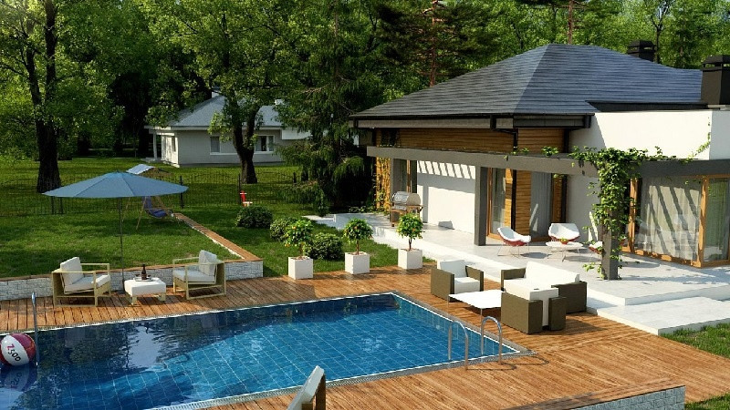 Nhà cấp 4 phong cách Nam Âu được tô điểm bởi một hồ bơi xinh đẹp bên cạnh. Ảnh: Htsport