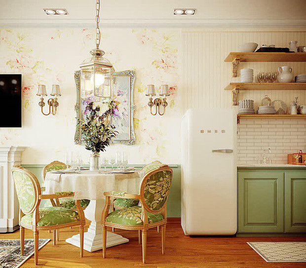 Nhà có gam màu chủ đạo là trắng và xanh lá.