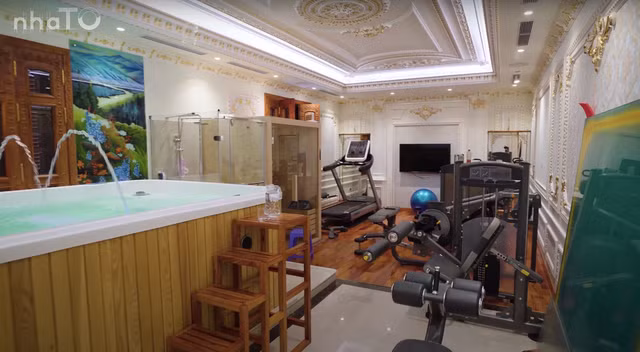 Không gian tầng 2 gồm 2 phòng ngủ, cùng với một phòng tập.