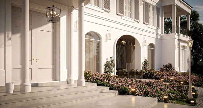 Khuôn viên biệt thự có sân vườn rộng rãi, trồng nhiều hoa và cây xanh.