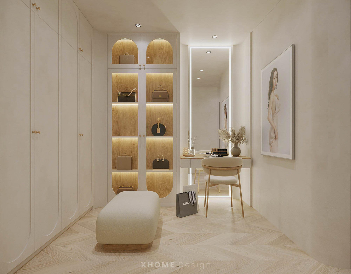 Phòng để đồ gọn gàng với kệ tử màu trắng, bàn trang điểm. Ảnh: FB Phan Minh Huyền