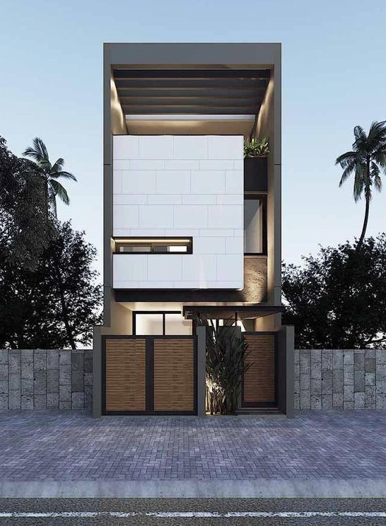 Điểm nhấn của ngôi nhà nằm ở khu vực tầng hai với khối hộp ốp đá màu trắng thiết kế nhô ra phía trước. Ảnh: Kientrucxaydung