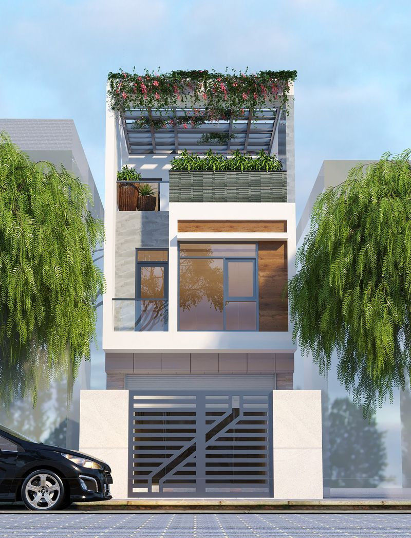 Để mặt tiền nhà ống không bị nhàm chán với các hình khối vuông vắn, kiến trúc sư trang trí thêm các hàng cây xanh. Ảnh: kts Vũ Việt Anh