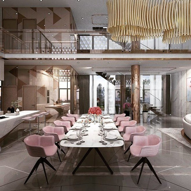 Khu vực bàn ăn thiết kế rộng rãi, thoáng đãng với bộ bàn ăn dài, hướng nhìn ra hồ bơi. Ảnh: FBNV