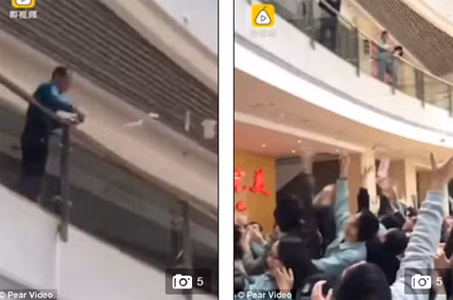 Vị doanh nhân này ném những xếp tiền loại 100 Nhân dân tệ từ ban công tầng 2 công ty. Ảnh: DM