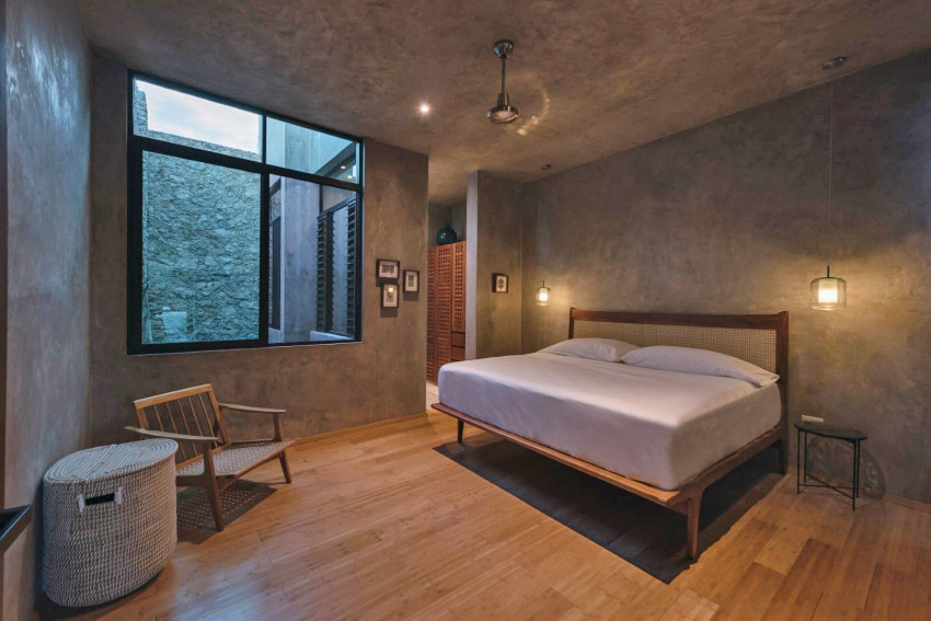 Có một phòng ăn cao gấp đôi, một khu vực bếp và một phòng ngủ chính với một phòng tắm. Không gian công cộng và khu vực riêng tư đều có các đường di chuyển khác biệt và rõ ràng.