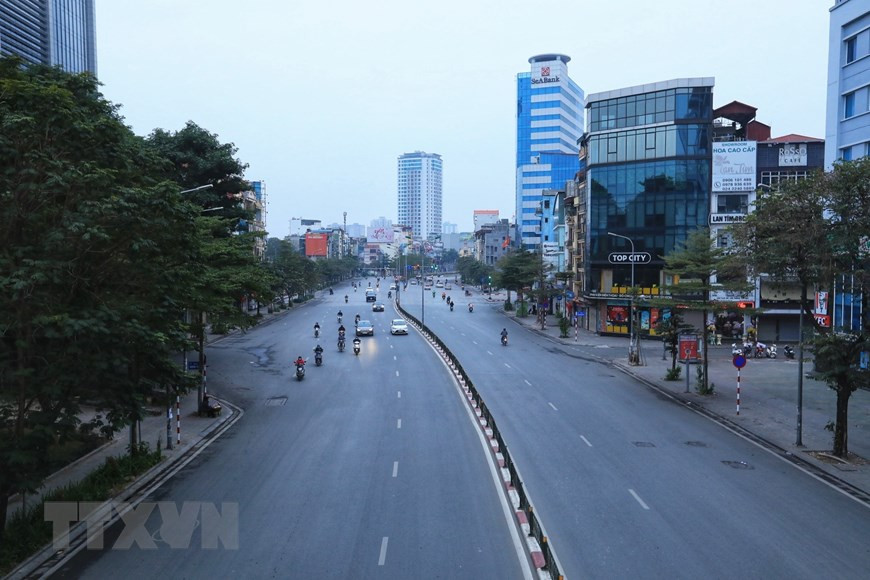  Đường phố vắng vẻ ngày đầu năm (ảnh chụp tại phố Tây Sơn, quận Thanh Xuân). (Ảnh: Tuấn Anh/TTXVN)