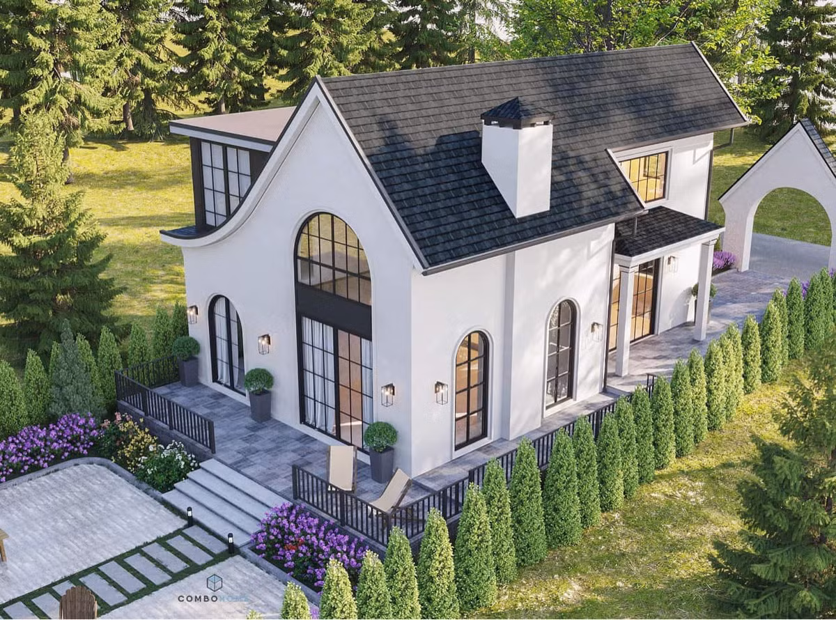 Xung quanh biệt thự là không gian cỏ và cây xanh mướt.