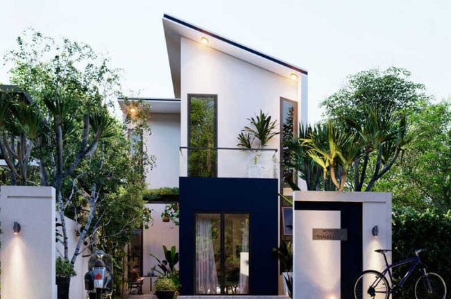 Việc sử dụng cửa kính giúp ánh sáng từ bên ngoài chiếu vào nhà một cách dễ dàng, khắc phục tình trạng oi bức, bí bách thường gặp ở nhà ống. Ảnh: Noithatdepmoi