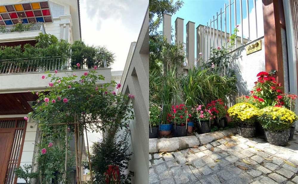 Căn biệt thự của Quý Bình có tông trắng và nâu chủ đạo. Trong nhà có khoảng sân vườn rộng rãi, hoa phủ kín lối đi. Ảnh: FB Quý Bình Lê