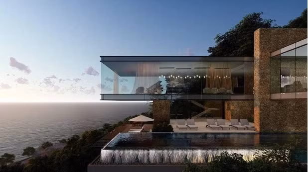 Bể bơi và phòng khách hướng thẳng ra biển, có thể ngắm trọn hoàng hôn.