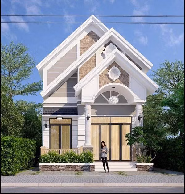 Hệ mái thái cao giúp ngôi nhà thêm thông thoáng, chống thấm tốt vào mùa mưa. Ảnh: Wedo