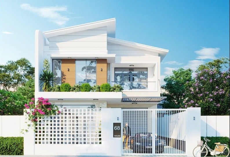 Nhà phố 2 tầng hiện đại được thiết kế khéo léo thêm khu vườn xanh mát ở tầng tum để đảm bảo được sự mát mẻ cho ngôi nhà vào những ngày hè nắng nóng. Ảnh: Wedo