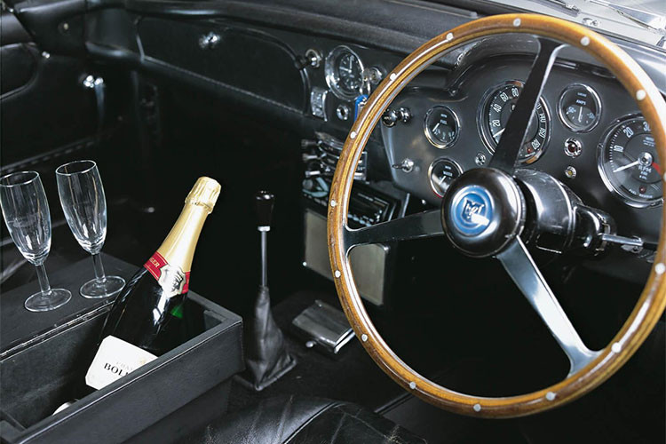 Chiếc Aston Martin DB5 trong GoldenEye có số khung DB5/1885/R. Sau khi quay xong, xe được Eon Productions sử dụng để quảng bá cho bộ phim, đồng thời được Aston Martin dùng quảng bá cho mẫu xe DB7 mới tại triển lãm xe hơi Detroit và Los Angeles khi Aston Martin ra mắt mẫu xe DB7. Aston Martin DB5 từng được trưng bày tại Bảo tàng xe Quốc gia Mỹ và Triển lãm Bond in Motion tại Covent Garden.