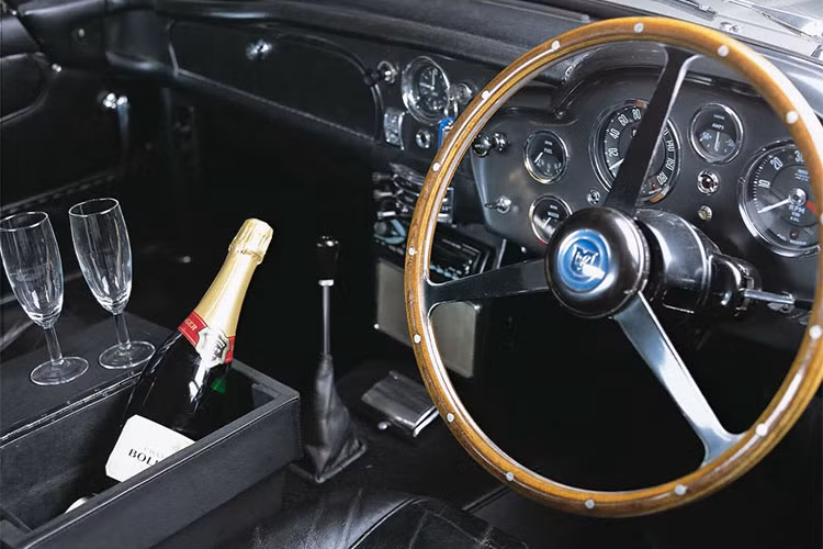 Chiếc Aston Martin DB5 trong GoldenEye có số khung DB5/1885/R. Sau khi quay xong, xe được Eon Productions sử dụng để quảng bá cho bộ phim, đồng thời được Aston Martin dùng quảng bá cho mẫu xe DB7 mới tại triển lãm xe hơi Detroit và Los Angeles khi Aston Martin ra mắt mẫu xe DB7. Aston Martin DB5 từng được trưng bày tại Bảo tàng xe Quốc gia Mỹ và Triển lãm Bond in Motion tại Covent Garden.