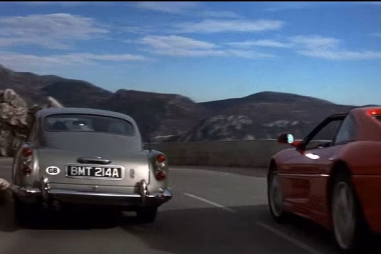 Aston Martin DB5 1965 xuất hiện trong cảnh quay dượt đuổi mở màn giữa Bond và sát thủ Xenia Onatopp (Famke Janssen) trên chiếc Ferrari 355 xuyên qua vùng đồi núi Monaco. Model này ra mắt thị trường lần cuối vào năm 2001 và trở thành mẫu xe đắt giá nhất mà Bond từng lái.