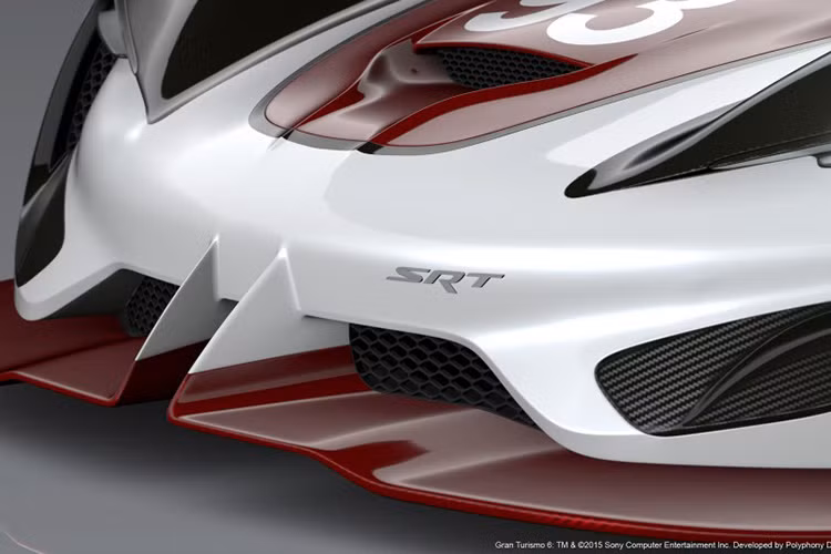 Cản trước cùng lọc gió được thiết kế khí động học dành cho các mẫu xe đua với hai màu đỏ trắng trên và dưới.