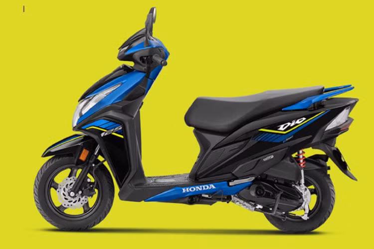 Về thiết kế, mẫu xe ga Honda DIO 125 2025 sở hữu ngoại hình nhỏ gọn, thể thao nhưng không kém phần thời trang. Thiết kế của xe nổi bật với cụm đèn pha cỡ lớn cùng các chi tiết tạo hình như cánh gió hai bên, mang đậm cảm hứng từ những mẫu xe đua. 