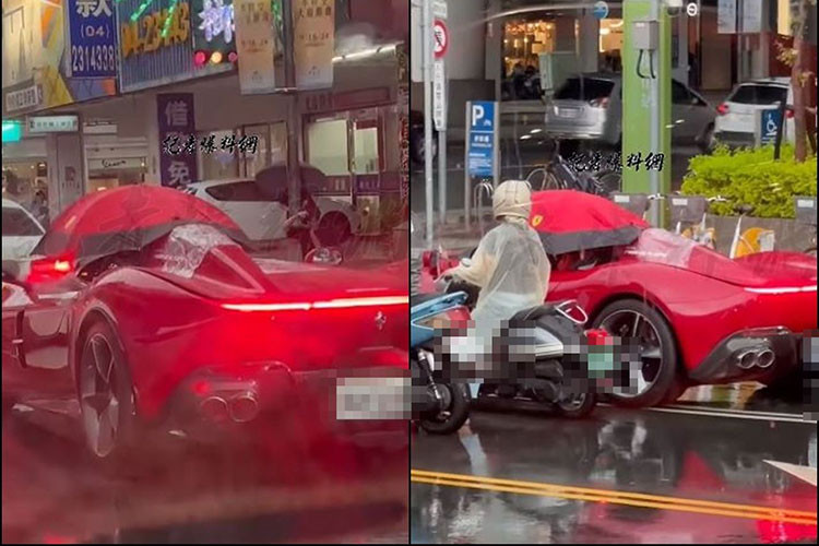 Điều thu hút sự chú ý của người đi đường không phải là vẻ ngoài nổi bật của chiếc xe Ferrari Monza SP1 mà là cảnh tượng kỳ lạ khi người lái đang cho xe di chuyển qua những con đường ướt đẫm mưa với sự hỗ trợ của một chiếc ô.