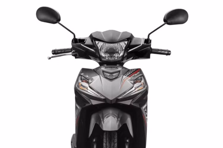 Phiên bản mới của Honda Wave Alpha 2025 mang đến một diện mạo thể thao hơn, với đồ họa trang trí đường kẻ nổi bật. Phần ốp đầu xe đã được thu gọn, và đèn hậu cũng được thiết kế lại, tạo nên vẻ ngoài hiện đại và năng động hơn. 