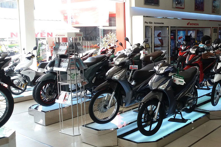 Moi ngay, co khoang 6.000 nguoi Viet tau xe may Honda-Hinh-2