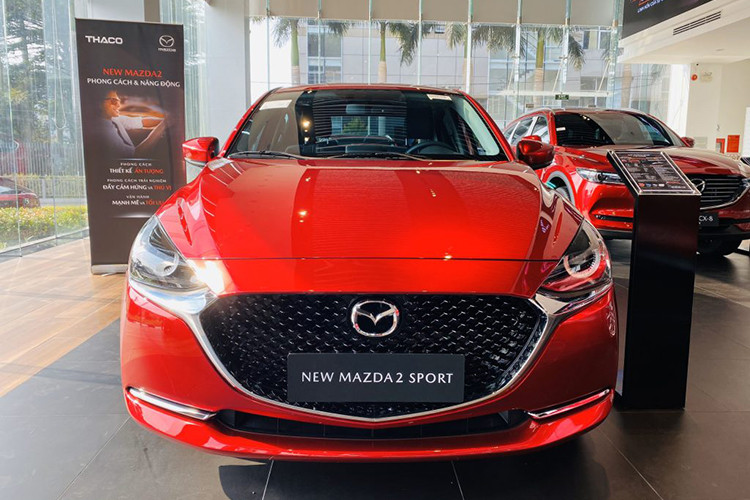 Mazda Viet Nam dieu chinh gia ban oto... 