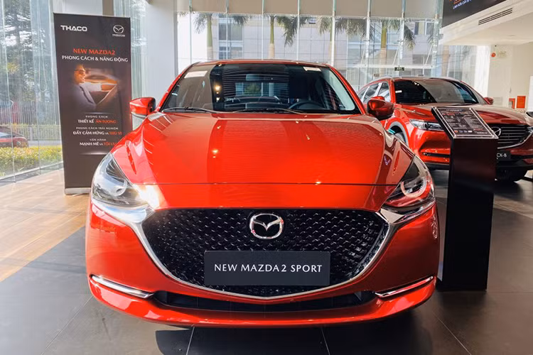 Mazda Viet Nam dieu chinh gia ban oto... 