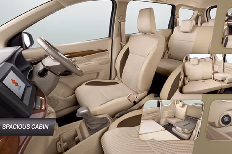 Về nội thất, đặc biệt là khu vực điều khiển trung tâm ốp gỗ giả và bố trí tách biệt. Hệ thống cửa gió điều hòa trải dài khu vực điều khiển, trong khi màn hình thông tin giải trí được đặt nổi – giống Ignis. Vô-lăng đáy phẳng tương tự người anh em Swift và Dzire mới. Xe được trang bị cửa gió điều hòa gắn trên trần xe cho hàng ghế sau. Hàng ghế thứ 2 có thể gập 60:40 và 50:50 với hàng ghế thứ 3.