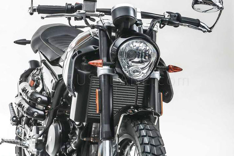 Đèn pha của xe mang thiết kế cổ điển với hình quả trám cách điệu, cặp gương chiếu hậu màu crôm được lắp ở gù tay lái, đồng hồ dạng tròn analog, pát biển số phía sau kiểu Diavel khá hiện đại.