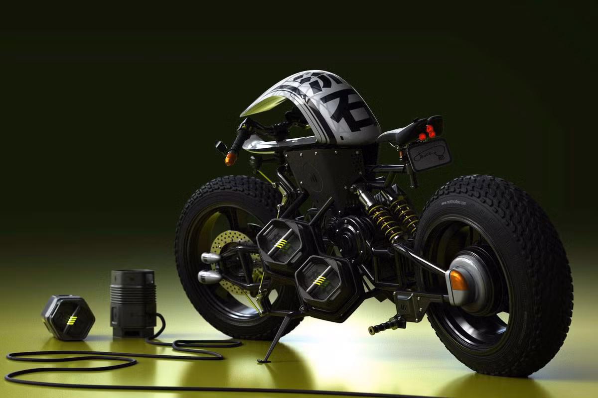 Phần hay nhất đó chính là bộ gắp trước sau đi cùng với giảm xóc cho một vẻ khá khùm khoằm và dị thường, hai phần nhô ra ở giữa xe như ống xả của động cơ tên lửa chính là các khối pin năng lượng của xe. Đây là tác phẩm của nhà thiết kế Matt Tkocz tại Los Angeles - Mỹ.