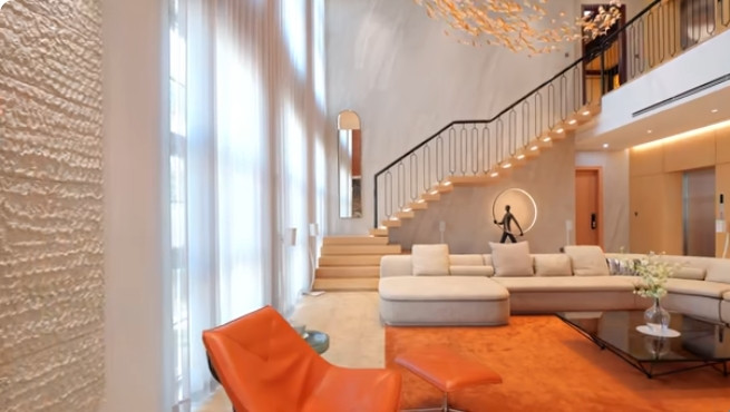 Căn penthouse gây choáng ngợp bởi tone màu "cam cá hồi" và phong cách đương đại Art Deco. Ảnh chụp màn hình