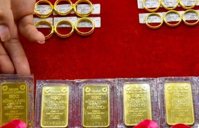 Gia vang hom nay 08/02: Dao chieu tang manh?