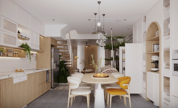 Khu bếp và bàn ăn với gam màu trắng chủ đạo. Ảnh: SBS House