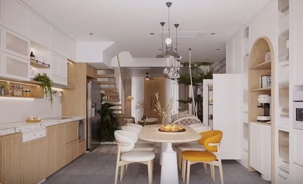 Khu bếp và bàn ăn với gam màu trắng chủ đạo. Ảnh: SBS House