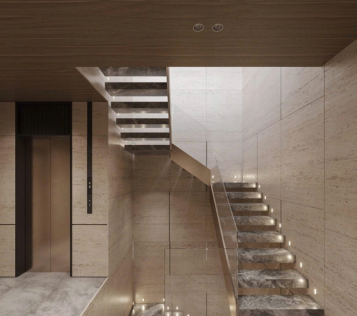 Cầu thang bộ thông thoáng, ốp gạch sáng bóng và trang trí đèn LED lấp lánh. Ảnh: FB Đoàn Văn Hậu