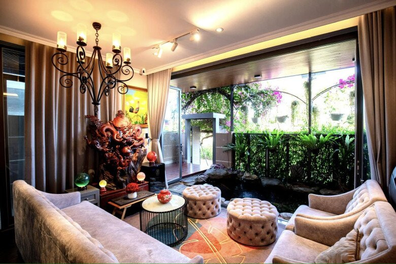 Phòng khách thiết kế mở, kết nối trực tiếp với sân vườn. Ảnh: FB Cao Thái Sơn