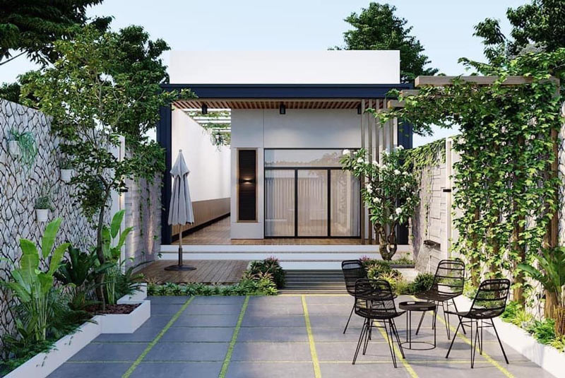 Với mẫu nhà cấp 4 có sân vườn, gia chủ thoải mái trồng cây, hoa và bố trí tiểu cảnh. Ảnh: Shome