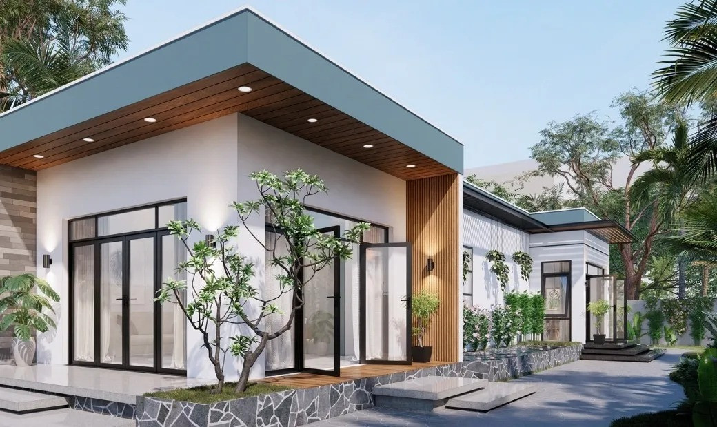 Với hai mặt tiền, ngôi nhà được bố trí thêm nhiều cửa lớn và cửa nhỏ, giúp cho không gian lấy ánh sáng và gió tự nhiên dễ dàng. Ảnh: Vinavic