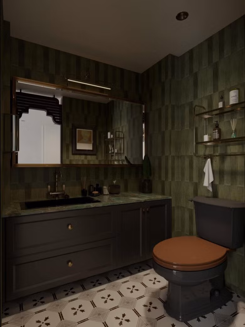 Nhà vệ sinh lát gạch tông xanh rêu kết hợp họa tiết vintage. Ảnh: FBNV