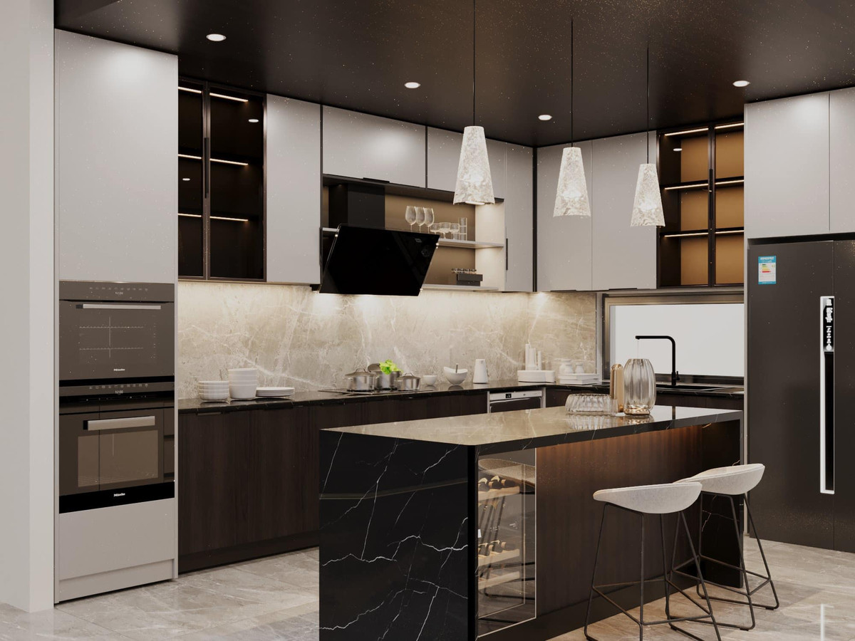 Khu vực bếp không quá lớn nhưng đầy đủ các trang thiết bị, chính giữa bếp là đảo bếp màu đen kết hợp tủ đựng đồ uống.Ảnh: FB Phạm Tuấn Hải