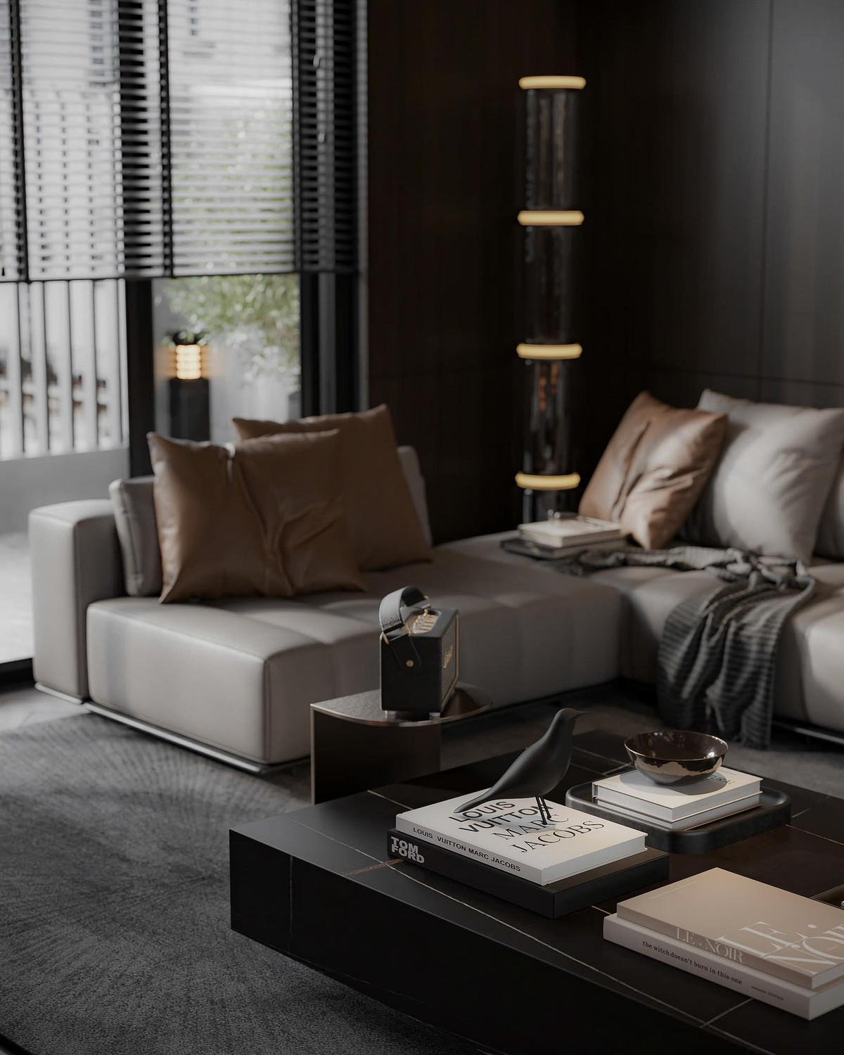 Tại phòng khách, Hằng Túi sử dụng tông màu tối với điểm nhấn là bộ sofa da cao cấp và bàn trà vuông. Ảnh: FB Hằng Túi