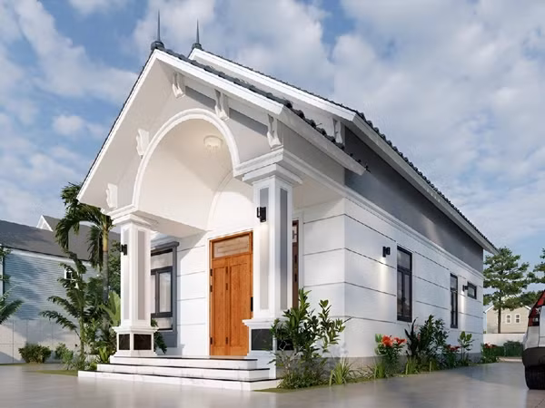 Với diện tích 5x25m2, nhà cấp 4 mái Thái có thể đáp ứng nhu cầu cho gia đình từ 2 - 3 thế hệ cùng chung sống. Ngôi nhà mang phong cách tối giản, mang đến không gian sống nhẹ nhàng, thư thái. Ảnh: SBS House