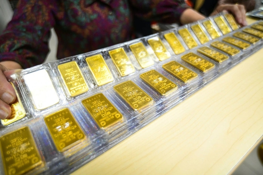 Gia vang hom nay 25/03: Vang nhan, vang mieng tang manh?